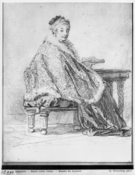 Russische Frau an einem Tisch mit einem Buch in der Hand